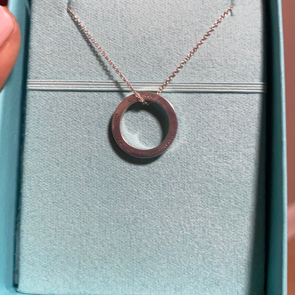 Tiffany 1837 Circle Pendant W 16 in sterling silver chain. Original box and bag